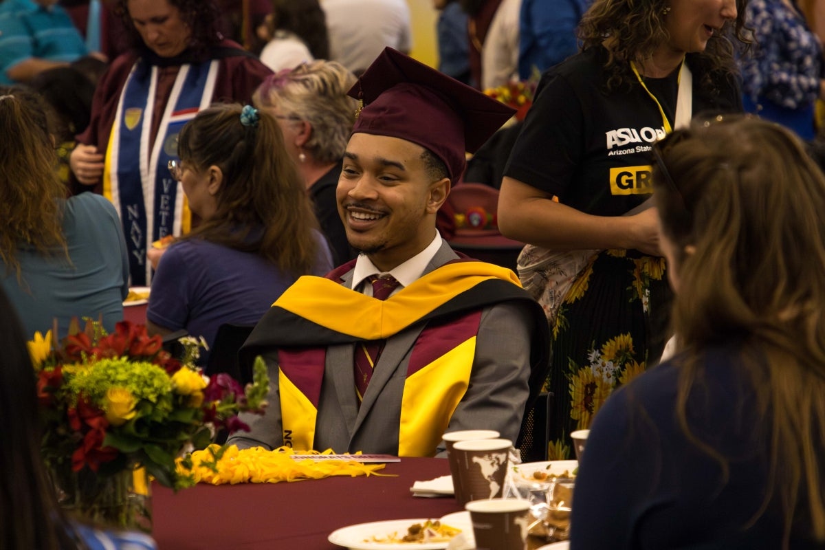 man in graduation cap and gown